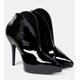 AlaÃ¯a Booties Slick patent leather ankle boots