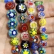 Perles de verre en forme de disque coloré en forme de bonbon motifs de fleurs Millefiori