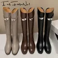 Bottes hautes en cuir véritable pour femmes épaisses à enfiler longues design automne hiver