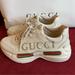 Gucci Shoes | Gucci Rhyton Gucci Logo Leather Sneakers | Color: Cream | Size: 9
