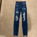 American Eagle Outfitters Jeans | Dark Blue Ripped High Rise Skinny Jean Size 000 Regular Length Skinny Jean | Color: Blue | Size: 00