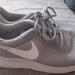 Nike Shoes | Gray And White Nike Tanjun | Color: Gray | Size: 10.5