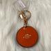 Coach Accessories | Coach Leather Round Mirror Charm Key Ring In Orange/Gold | Color: Gold/Orange | Size: Os