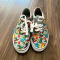 Vans Shoes | Kids Or Women’s Vans Low Top Canvas Shoes Dinosaur Print Skater Shoes | Color: Gray | Size: 5b