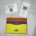 Coach Accessories | Coach Slim Id Card Case In Colorblock | Color: Orange/Yellow | Size: Os