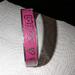 Coach Jewelry | Coach Logo Pink Enamel Poppy Bangle Silver Tone Bracelet | Color: Pink/Silver | Size: 2 1/2"