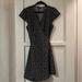 Brandy Melville Dresses | Black With White Flowers Brandy Melville Wrap Dress | Color: Black | Size: One Size