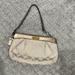 Coach Accessories | Coach Cream And Gold Original Pattern Wristlet | Color: Cream/Gold | Size: Os