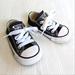 Converse Shoes | Converse Baby Black Canvas Chuck Taylor Sneakers Size 4 Baby | Color: Black/White | Size: 4bb