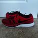 Nike Shoes | Nike Flyknit Trainers Red/Black 5.5m/7w | Color: Black/Red | Size: 7