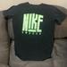 Nike Shirts & Tops | Boys Nike Shirt Size Large. Good Condition | Color: Black/Green | Size: Lb