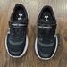 Under Armour Shoes | Black Size 2.5 Kids Unisex Under Armour Velcro Strap Sneakers. Gently Used. | Color: Black/White | Size: Unisex 2.5y