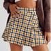 Free People Skirts | Free People Honey Pleated Mini Skirt In Yellow Black Plaid | Color: Black/Yellow | Size: 12