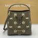 Michael Kors Bags | Michael Kors Mercer Small Logo Embossed Leather Bucket Bag Color Olive | Color: Green/White | Size: Various