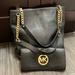 Michael Kors Bags | Michael Kors Black Pebbled Leather Shoulder Bag With Matching Wallet | Color: Black/Gold | Size: 12”W 11”L