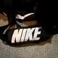 Nike Bags | Nike Large Duffel Bag With Padded Adjustable, Shoulder Strap Side Pockets Unisex | Color: Black/White | Size: Os