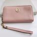 Michael Kors Bags | Micheal Kors Pebbled Leather Zip Around Wallet/Wristlet | Color: Pink | Size: Os