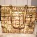 Coach Bags | Authentic Golden Multi Font Coach Tote Bag | Color: Cream/Gold | Size: Os