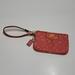 Coach Bags | Coach Signature Wristlet Purse Bag Clutch Melon Orange Coral Pink Women's Os | Color: Orange/Pink | Size: Os