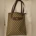 Gucci Bags | Gucci Coated Canvas Tote. Comes With Certificate Of Authenticity! | Color: Brown/Tan | Size: Os