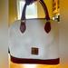 Dooney & Bourke Bags | Dooney & Bourke Pebbled Leather Zip Zip Satchel. Gently Used. | Color: White | Size: H 9.25 X W 5.25 X L 11.5