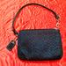 Coach Bags | Coach Black Leather Strap Id Tag Wristlet Makeup Mini Coin Bag Euc | Color: Black/Silver | Size: 6 X 4.5"