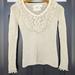 Anthropologie Sweaters | Anthropologie Angel Of The North Cream Colored V Neck Sweater With Pom Pom Trim | Color: Cream | Size: S