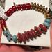 Anthropologie Jewelry | Anthropologie Stretch Gold, Maroon, And Blue Bracelet. | Color: Blue/Gold | Size: Os