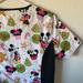 Disney Tops | Disney Mickey Mouse And Minnie Gingerbread Christmas Scrub Top Women’s Xs | Color: White | Size: Xs