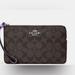 Coach Bags | Coach Large Corner Zip Wristlet In Signature Canvas | Color: Brown/Purple | Size: Os