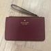 Kate Spade Bags | Designer Kate Spade Wristlet - Maroon | Color: Purple | Size: Os