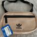 Adidas Bags | Brand New ! Addidas Waist Pack . Rose Gold And Black . Perfect Size ! | Color: Pink | Size: Os