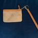 Dooney & Bourke Bags | Cream Dooney Monogram Wristlet Or Coin Purse Never Used | Color: Cream/Tan | Size: 4x6