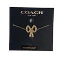 Coach Jewelry | Coach Antique Bow Slider Bracelet, Gold Tone | Color: Gold | Size: Os