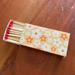 Urban Outfitters Accents | Adorable Flower Print Matches And Match Box! | Color: Orange/Yellow | Size: Os