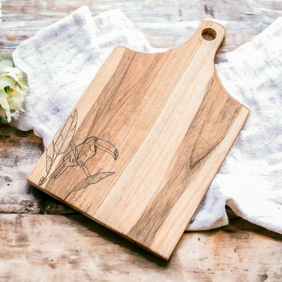 Toucan's Delicacies,'Handcrafted Laurel Wood Cutting Board with Toucan Engraving'