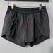 Lululemon Athletica Shorts | Lululemon Run Breeze By Short Laser Cut Black Liner Size Xs (4) Golf Tennis Gym | Color: Black | Size: Xs(4)