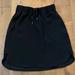 Lululemon Athletica Skirts | Lululemon Black On The Fly Skirt 6 | Color: Black | Size: 6