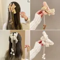 Pince à cheveux rétro en peluche pour filles nœud en peluche pince à gland coiffure queue de