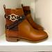 Michael Kors Shoes | Nwot Michael Kors Rory Flat Bootie Ankle Boots Mk Logo Hardware Luggage Size 6 | Color: Brown | Size: 6