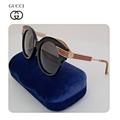 Gucci Accessories | Gucci Women's Sunglasses Black Gold Round Logo Gg0282sa Italy Authentic | Color: Black/Gold | Size: Os