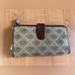 Dooney & Bourke Bags | Dooney And Bourke Wallet Signature Purse Bag Clutch | Color: Brown/Tan | Size: Os