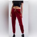 Nike Pants & Jumpsuits | Nike Joggers | Color: Red/Yellow | Size: S