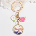 Porte-clés de dessin animé japonais Fuji Mountain Sakura Flower porte-clés en émail cadeau