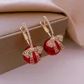 Boucles d'oreilles à tige de perle pour femmes rouge coréen blanc beige nœud papillon nœud