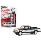 1990 GMC S-15 Sierra Pickup Truck Black and White with Flames Flowtech Exhaust Running on Empty Series 16 1/64 Diecast Model Car by Greenlight