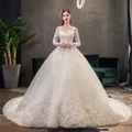 Robe de mariée élégante à manches longues robe de Rhchérie dentelle de luxe grande taille