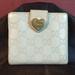 Gucci Bags | Gucci Vintage Ivory Gg Guccissima Leather French Wallet | Color: Cream/Gold | Size: Os