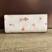 Coach Bags | Coach Slim Wallet Sig Canvas With Shooting Stars Print Nwt | Color: Cream/Pink | Size: Os