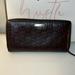 Gucci Bags | Gucci Gg Signature Leather Zip Around Wallet In Brown Authentic | Color: Brown | Size: Os